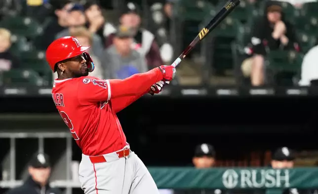 Los Angeles Angels' Jorge Soler hits a sacrifice fly to Chicago White Sox right fielder Everson Pereira during the first inning of a baseball game in Chicago, Monday, April 27, 2026. (AP Photo/Nam Y. Huh)