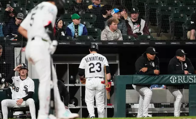 Chicago White Sox's Andrew Benintendi (23) walks to the dugout after being called out on strikes during the third inning of a baseball game against the Los Angeles Angels in Chicago, Monday, April 27, 2026. (AP Photo/Nam Y. Huh)