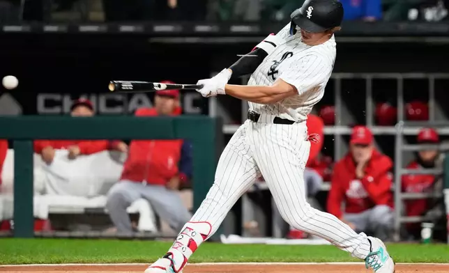 Chicago White Sox's Munetaka Murakami, of Japan, hits a single during the first inning of a baseball game against the Los Angeles Angels in Chicago, Monday, April 27, 2026. (AP Photo/Nam Y. Huh)