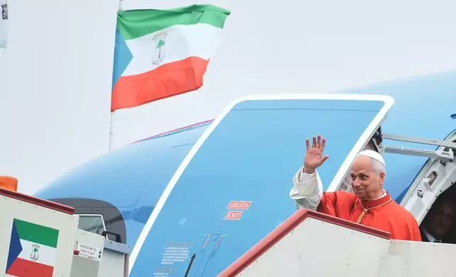 Pope Leo XIV arrives at Malabo International Airport in Malabo, Equatorial Guinea, Tuesday, April 21, 2026, on the ninth day of his 11-day pastoral visit to Africa. (AP Photo/Andrew Medichini)