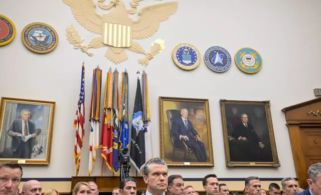 Secretary of Defense Pete Hegseth arrives at the witness table for a House Committee on Armed Services business meeting on the Department of Defense Fiscal Year 2027, on Capitol Hill, Wednesday, April 29, 2026, in Washington. (AP Photo/Rod Lamkey Jr.)