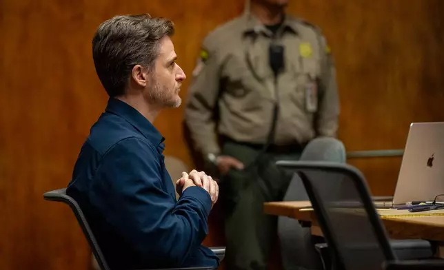 Gerhardt Konig appears in court before closing arguments in his attempted murder trial, Tuesday, April 7, 2026, in Honolulu. (AP Photo/Mengshin Lin, Pool)