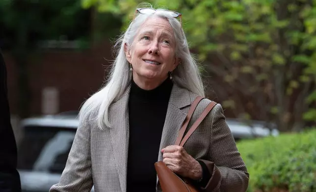 Patrice Failor, wife of former FBI Director James Comey, arrives at the federal courthouse in Alexandria, Va., Wednesday, April 29, 2026. (AP Photo/Cliff Owen)