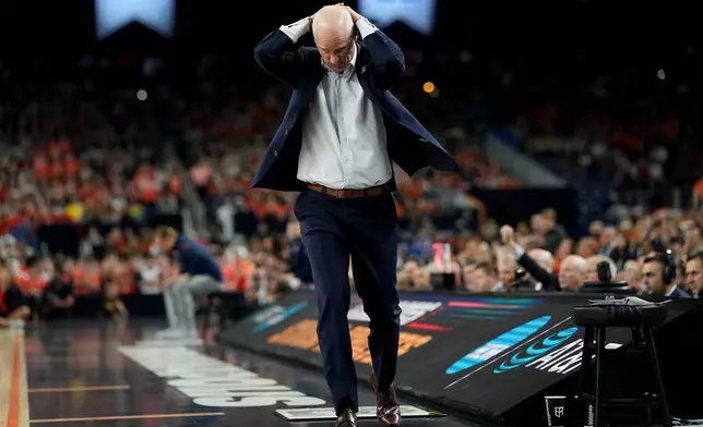 UConn head coach Dan Hurley reacts after a call during the second half of an NCAA college basketball tournament semifinal game against Illinois at the Final Four, Saturday, April 4, 2026, in Indianapolis. (AP Photo/Abbie Parr)