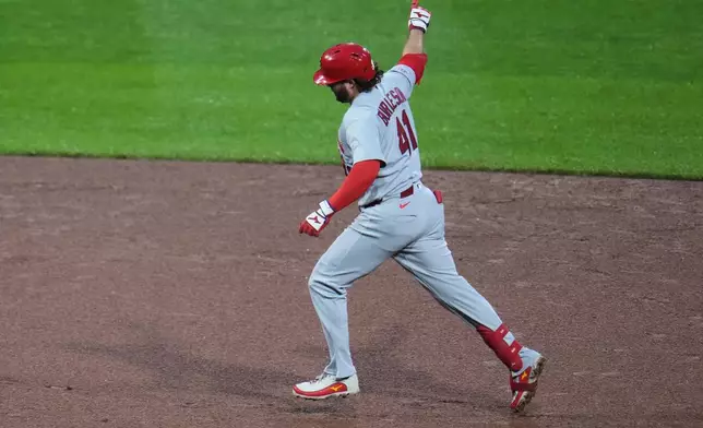 St. Louis Cardinals' Alec Burleson celebrates as he rounds the bases after hitting a two-run home run off Pittsburgh Pirates pitcher Bubba Chandler during the fifth inning of a baseball game in Pittsburgh, Wednesday, April 29, 2026. (AP Photo/Gene J. Puskar)