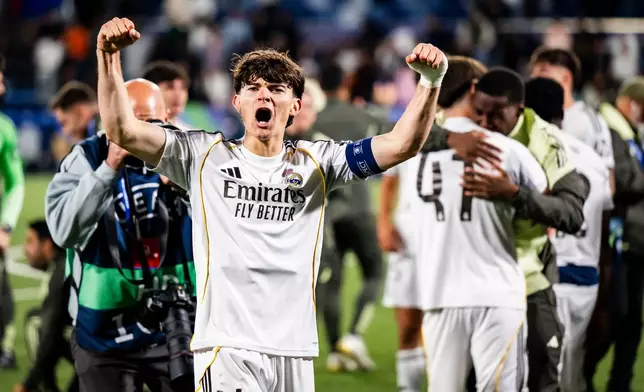 Real Madrid's Carlos Diez celebrates the victory during the Youth League final soccer match between Club Brugge and Real Madrid in Lausanne, Switzerland, Monday, April 20, 2026. (Jean-Christophe Bott/Keystone via AP)