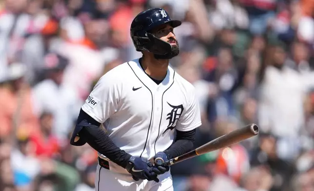 Detroit Tigers' Riley Greene watches his three-run home run against the Miami Marlins during the third inning of a baseball game Saturday, April 11, 2026, in Detroit. (AP Photo/Paul Sancya)