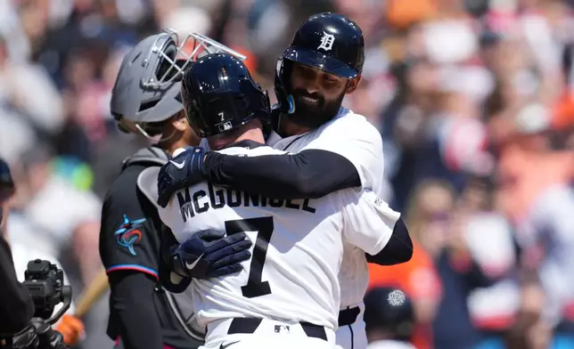 Detroit Tigers' Riley Greene celebrates his three-run home run with Kevin McGonigle (7) against the Miami Marlins during the third inning of a baseball game Saturday, April 11, 2026, in Detroit. (AP Photo/Paul Sancya)