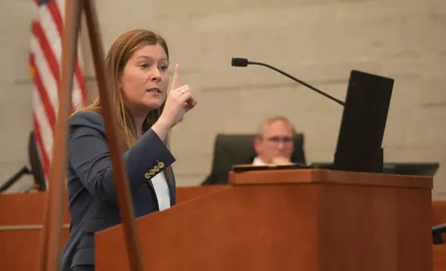 Attorney Kaitlyn Stephens speaks during the defense's opening statements in the retrial of former Franklin County Deputy Jason Meade, who is charged with murder and reckless homicide in the 2020 killing of Casey Goodson Jr., inside Franklin County Common Pleas Court in Columbus, Ohio, Thursday, April 23, 2026. (Doral Chenoweth/Pool Photo via AP)