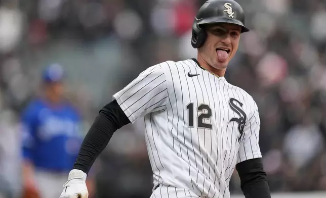 Chicago White Sox's Colson Montgomery (12) runs the bases after hitting a home run during the sixth inning of a baseball game against the Toronto Blue Jays, Saturday, April 4, 2026, in Chicago. (AP Photo/Erin Hooley)