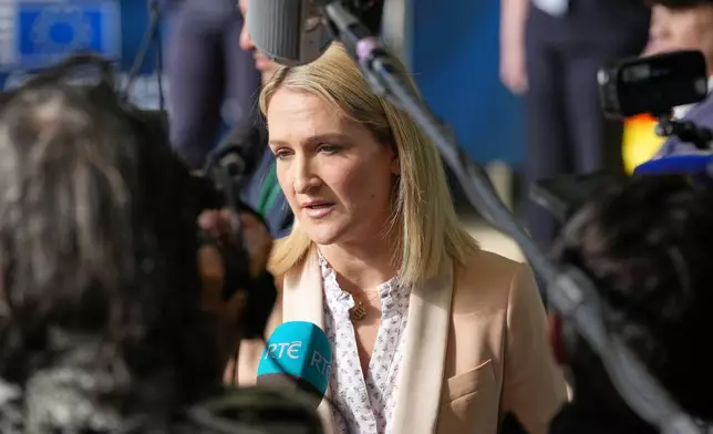 Ireland's Foreign Minister Helen McEntee speaks with the media as she arrives for a meeting of EU foreign ministers at the European Council building in Luxembourg, Tuesday, April 21, 2026. (AP Photo/Virginia Mayo)