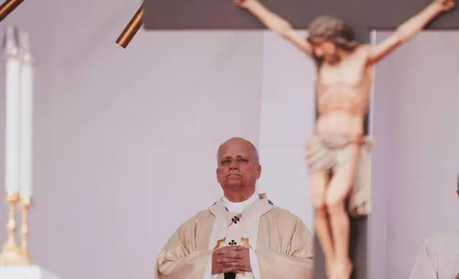 Pope Leo XIV presides over Sunday Mass, Sunday, April 19, 2026, in Kilamba, some 30 kilometers south of Luanda, Angola, on the seventh day of an 11-day apostolic journey to Africa. (AP Photo/Andrew Medichini)