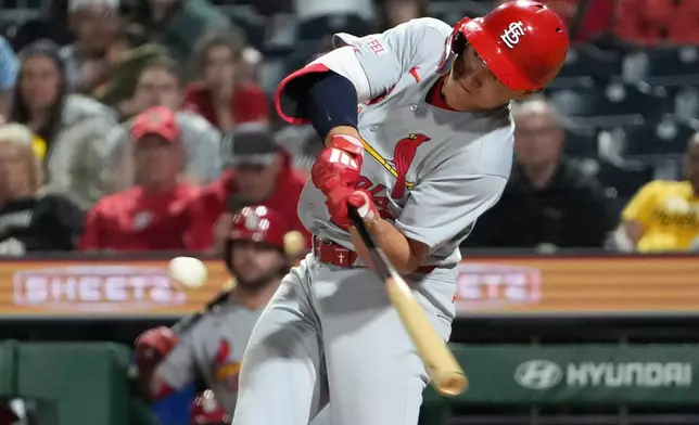 St. Louis Cardinals' JJ Wetherholt connects with a pitch from Pittsburgh Pirates pitcher Dennis Santana for a home run in the ninth inning of a baseball game, in Pittsburgh, Monday, April 27, 2026. (AP Photo/Tom E. Puskar)