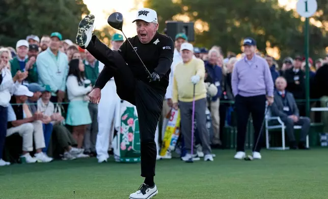 Gary Player kicks his leg in the air after hitting the ceremonial tee shot on the first hole during the first round of the Masters golf tournament at the Augusta National Golf Club, Thursday, April 9, 2026, in Augusta, Ga. (AP Photo/David J. Phillip)