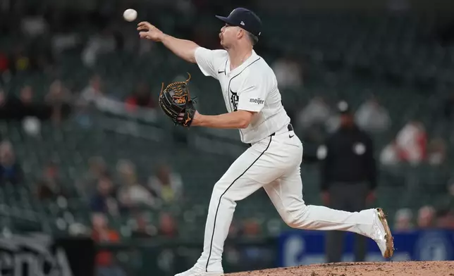Detroit Tigers' Jake Rogers pitches against the Milwaukee Brewers during the ninth inning of a baseball game Tuesday, April 21, 2026, in Detroit. (AP Photo/Paul Sancya)