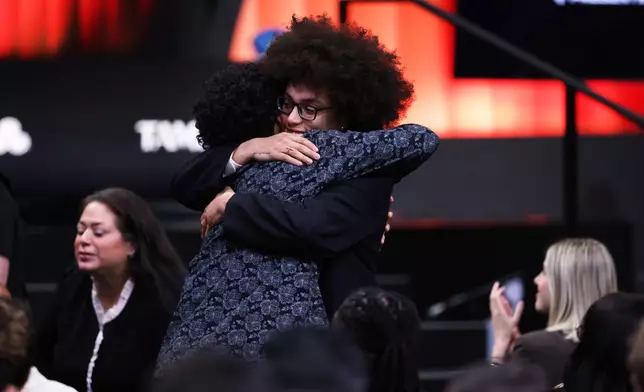 Texas Christian guard Olivia Miles reacts after being selected second overall by the Minnesota Lynx in the first round of the WNBA basketball draft Monday, April 13, 2026, in New York. (AP Photo/Pamela Smith)