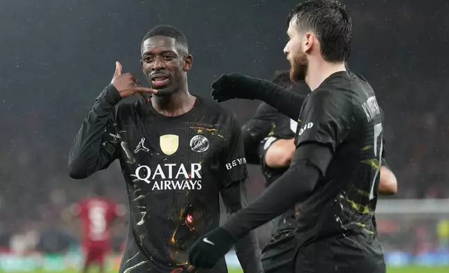 PSG's Ousmane Dembele celebrates after scoring during the Champions League quarterfinal second leg soccer match between Liverpool and Paris Saint-Germain in Liverpool, England, Tuesday, April 14, 2026. (AP Photo/Jon Super)