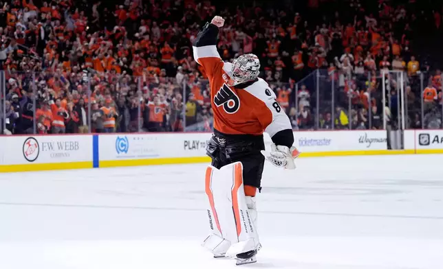 Philadelphia Flyers' Dan Vladar reacts after the Flyers won Game 6 against the Pittsburgh Penguins in the first round of the NHL hockey Stanley Cup playoffs series Wednesday, April 29, 2026, in Philadelphia. (AP Photo/Matt Slocum)