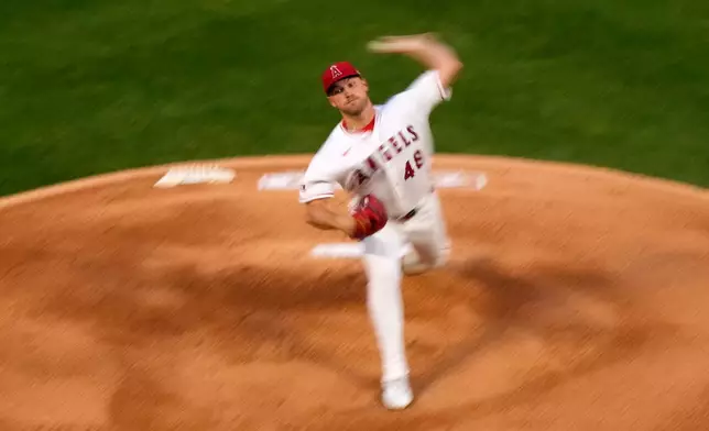 Los Angeles Angels starting pitcher Reid Detmers throws to the plate during the first inning of an opening-day baseball game against the Seattle Mariners, Friday, April 3, 2026, in Anaheim, Calif. (AP Photo/Mark J. Terrill)