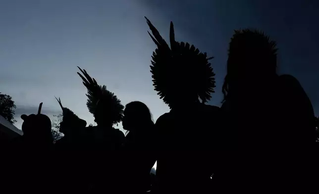 Kayapo people gather at the Acampamento Terra Livre, an Indigenous mobilization event focused on land rights and environmental protection, in Brasilia, Brazil, Sunday, April 5, 2026. (AP Photo/Eraldo Peres)