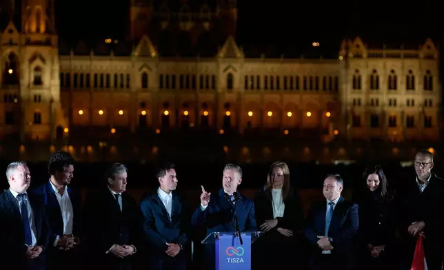 Peter Magyar, the leader of the opposition Tisza party, addresses supporters after claiming victory in a parliamentary election in Budapest, Hungary, Sunday, April 12, 2026. (AP Photo/Darko Bandic)