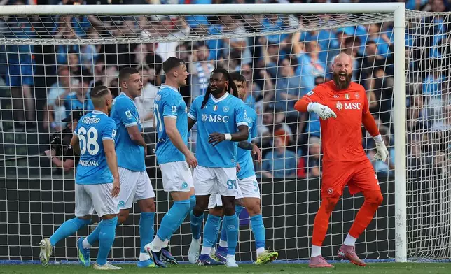 Napoli's goalkeeper Vanja Milinkovic-Savic celebrates a save during the Italian Serie A soccer match between Napoli and Lazio in Naples, Italy, Saturday, April 18, 2026. (Alessandro Garofalo/LaPresse via AP)