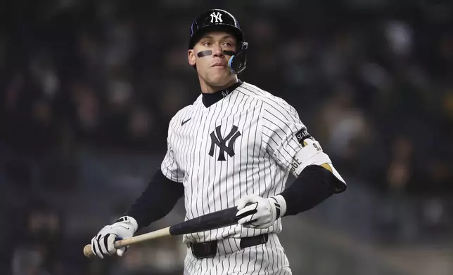 New York Yankees' Aaron Judge strikes out during the fifth inning of a baseball game against the Athletics, Wednesday, April 8, 2026, in New York. (AP Photo/Heather Khalifa)