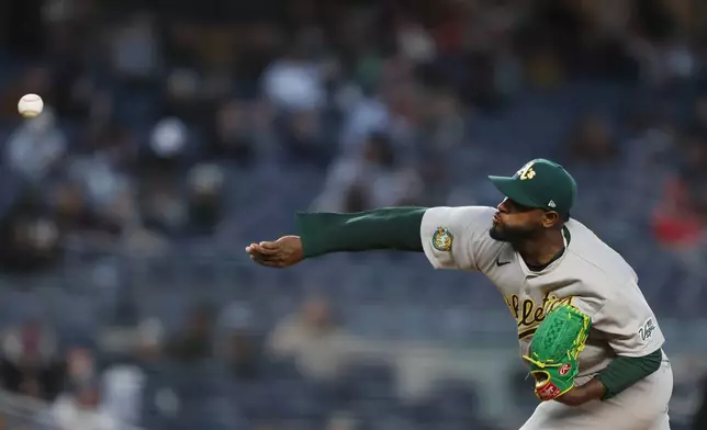 Athletics pitcher Luis Severino throws during the first inning of a baseball game against the New York Yankees, Wednesday, April 8, 2026, in New York. (AP Photo/Heather Khalifa)