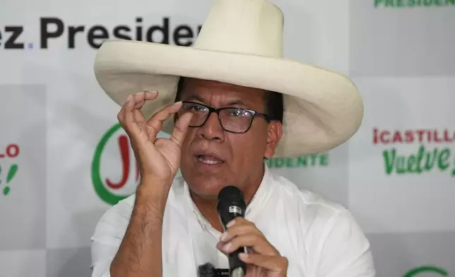 Roberto Sanchez, presidential candidate of Together for Peru party, speaks during a press conference in Lima, Peru, Saturday, April 18, 2026. (AP Photo/Guadalupe Pardo)