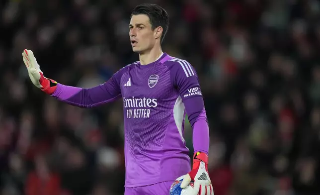 Arsenal's goalkeeper Kepa Arrizabalaga gestures during the English FA Cup quaterfinal soccer match between Southampton and Arsenal in Southampton, England, Saturday, April 4, 2026. (AP Photo/Dave Shopland)
