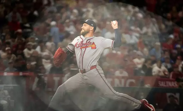 FILE - Atlanta Braves pitcher Dylan Lee delivers during the sixth inning of a baseball game against the Los Angeles Angels, Tuesday, April 7, 2026, in Anaheim, Calif. (AP Photo/Ethan Swope, File)
