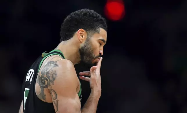 Boston Celtics forward Jayson Tatum celebrates after scoring in the first half of an NBA basketball game against the Toronto Raptors, Sunday, April 5, 2026, in Boston. (AP Photo/Steven Senne)