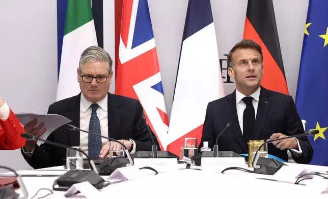 British Prime Minister Keir Starmer, left, and French President Emmanuel Macron co-host a multinational virtual summit at the Elysee Presidential Palace in Paris, Friday April 17, 2026 (Tom Nicholson/Pool Photo via AP)
