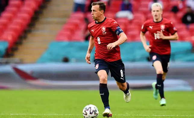 FILE - Czech Republic's Vladimir Darida dribles during the Euro 2020 soccer championship group D match between the Czech Republic and England at Wembley stadium in London, Tuesday, June 22, 2021. (Justin Tallis/Pool Photo via AP, File)