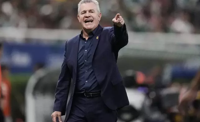 FILE - Mexico's coach Javier Aguirre directs his team during a international friendly soccer match against Ecuador at Akron stadium in Guadalajara, Mexico, Tuesday, Oct. 14, 2025. (AP Photo/Eduardo Verdugo, File)