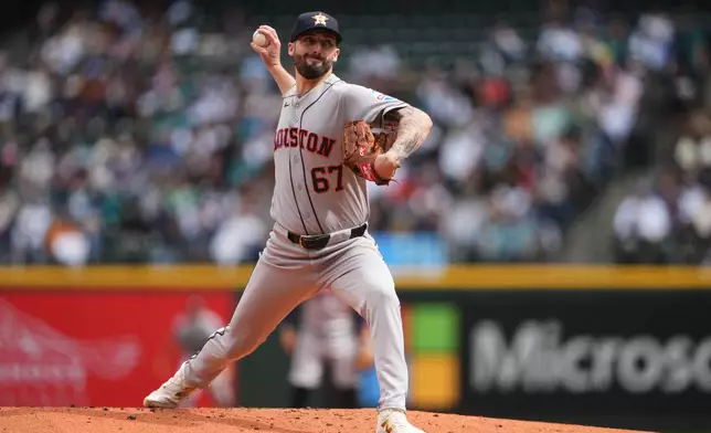 Houston Astros starting pitcher Cody Bolton throws against the Seattle Mariners during the first inning of a baseball game, Sunday, April 12, 2026, in Seattle. (AP Photo/Lindsey Wasson)