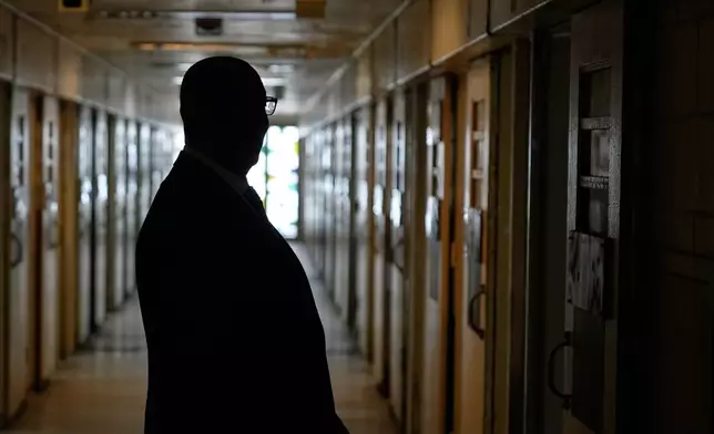 Stanley Richards, NYC Department of Correction commissioner, looks at the housing unit, currently unoccupied, where he was previously incarcerated on Rikers Island in New York, Tuesday, April 14, 2026. (AP Photo/Seth Wenig)