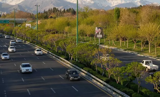 A billboard of Iranian Supreme Leader Ayatollah Mojtaba Khamenei stands on the side of a highway in Tehran, Iran, Friday, April 10, 2026. (AP Photo/Vahid Salemi)