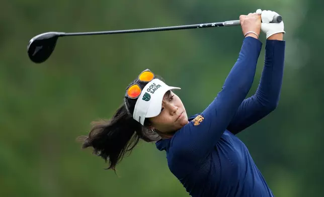 Patty Tavatanakit, of Thailand, watches her tee shot on the fifth hole during the third round of the Chevron Championship LPGA golf tournament Saturday, April 25, 2026, in Houston. (AP Photo/Ashley Landis)