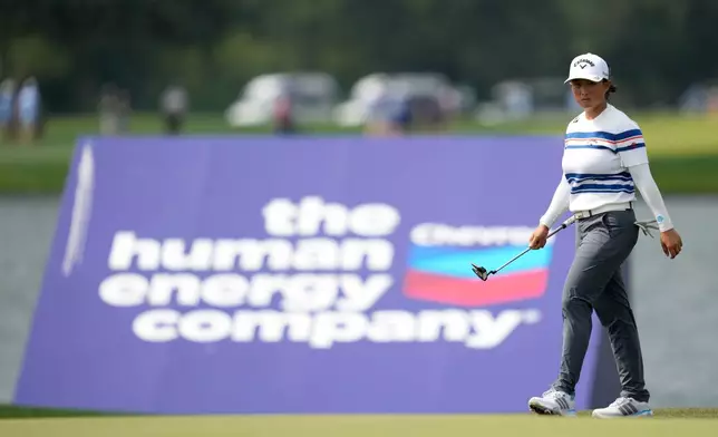 Ruoning Yin, of China, walks on the green on the 17th hole during the third round of the Chevron Championship LPGA golf tournament Saturday, April 25, 2026, in Houston. (AP Photo/Ashley Landis)