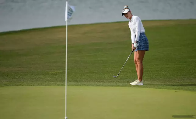Nelly Korda chips to the green on the 17th hole during the third round of the Chevron Championship LPGA golf tournament Saturday, April 25, 2026, in Houston. (AP Photo/Ashley Landis)