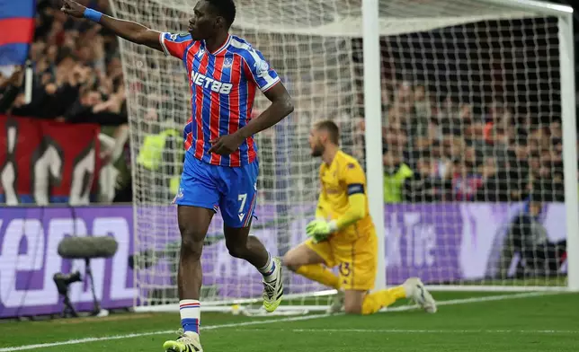Crystal Palace's Ismaila Sarr celebrates after scoring during the Europa Conference League first-leg quarter-final soccer match between Crystal Palace and Fiorentina in London, Thursday, April 9, 2026. (AP Photo/Ian Walton)