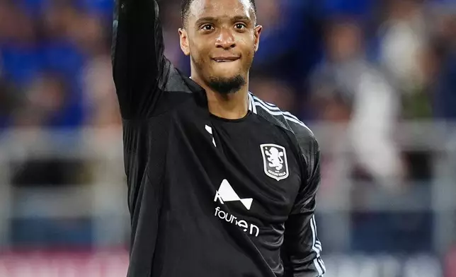 Aston Villa's Ezri Konsa celebrates scoring during the Europa League soccer match between Bologna and Aston Villa in Bologna, Italy, Thursday April 9, 2026. (Massimo Paolone/LaPresse via AP)