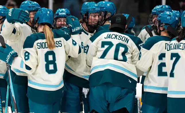 Seattle Torrent's Hilary Knight (centre) celebrates the team's win against the Ottawa Charge after third period PWHL hockey action in Ottawa, on Wednesday, April 8, 2026. (Justin Tang/The Canadian Press via AP)