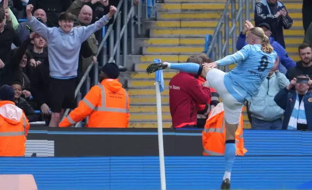 Manchester City's Erling Haaland celebrates after scoring during the FA Cup quarter-final soccer match between Manchester City and Liverpool in Manchester, England, Saturday, April 4, 2026. (AP Photo/Jon Super)