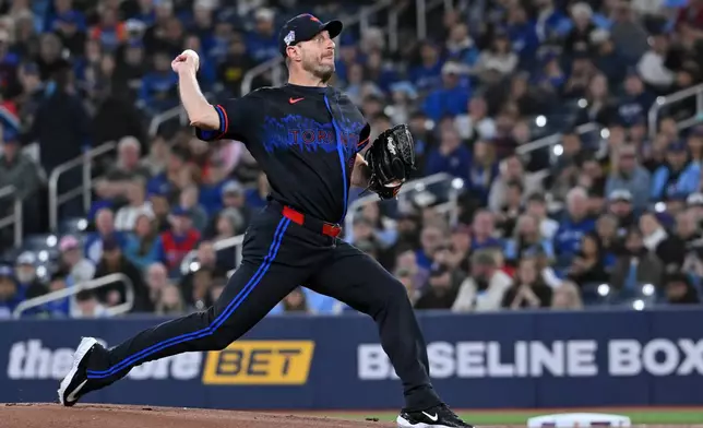 Toronto Blue Jays pitcher Max Scherzer throws to a Cleveland Guardians batter in first-inning baseball game action in Toronto, Friday, April 24, 2026. (Jon Blacker/The Canadian Press via AP)
