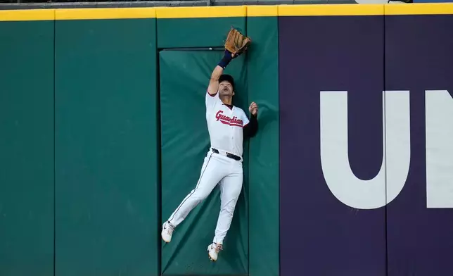 Cleveland Guardians center fielder Steven Kwan catches a fly ball for an out on a ball hit by Baltimore Orioles' Taylor Ward in the third inning of a baseball game in Cleveland, Thursday, April 16, 2026. (AP Photo/Sue Ogrocki)