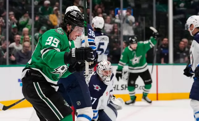 Dallas Stars center Matt Duchene celebrates his goal against the Winnipeg Jets in the first period of an NHL hockey game Thursday, April 2, 2026, in Dallas. (AP Photo/Tony Gutierrez)