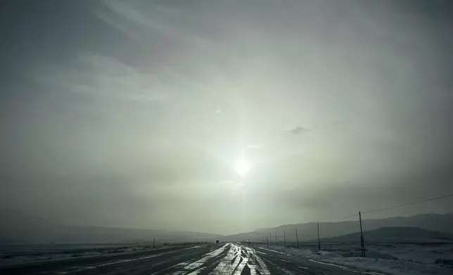 A deserted road stretches toward the Kapikoy border crossing between Turkey and Iran, near Van, Turkey, Saturday, April 4, 2026. (AP Photo/Francisco Seco)