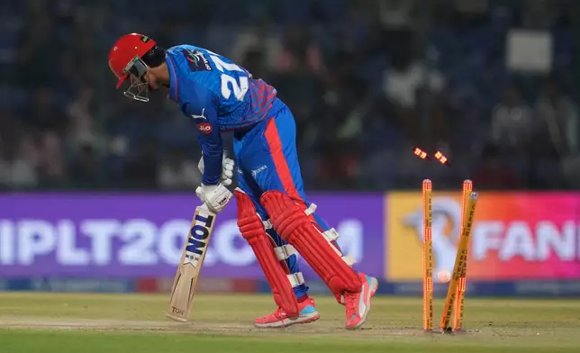 Delhi Capitals' Sahil Parakh bowled out by Royal Challengers Bengaluru's Bhuvneshwar Kumar during the Indian Premier League cricket match between Delhi Capitals and Royal Challengers Bengaluru in Delhi, India, Monday, April 27, 2026. (AP Photo/Manish Swarup)